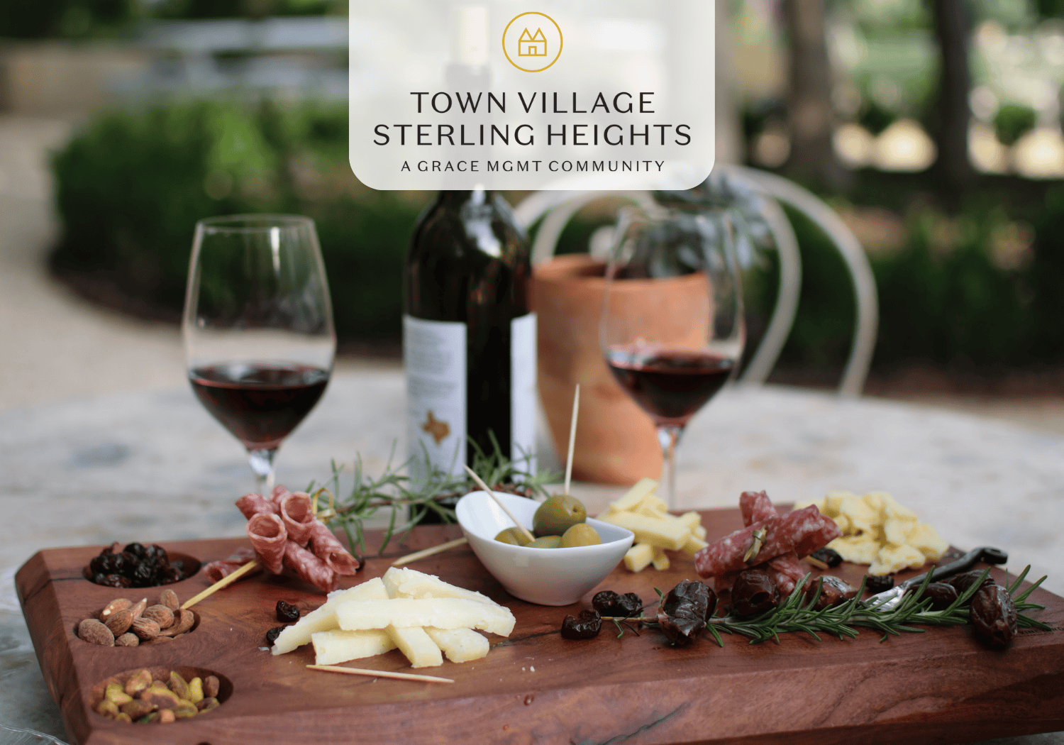 TVSH - Wine and Cheese Tasting - Town Village Sterling Heights wine and cheese on cutting board